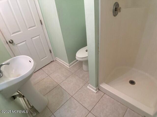273 Stuart Street Howell, NJ 07731 - Photo 9 of 18 a bathroom with a granite countertop sink a toilet and shower