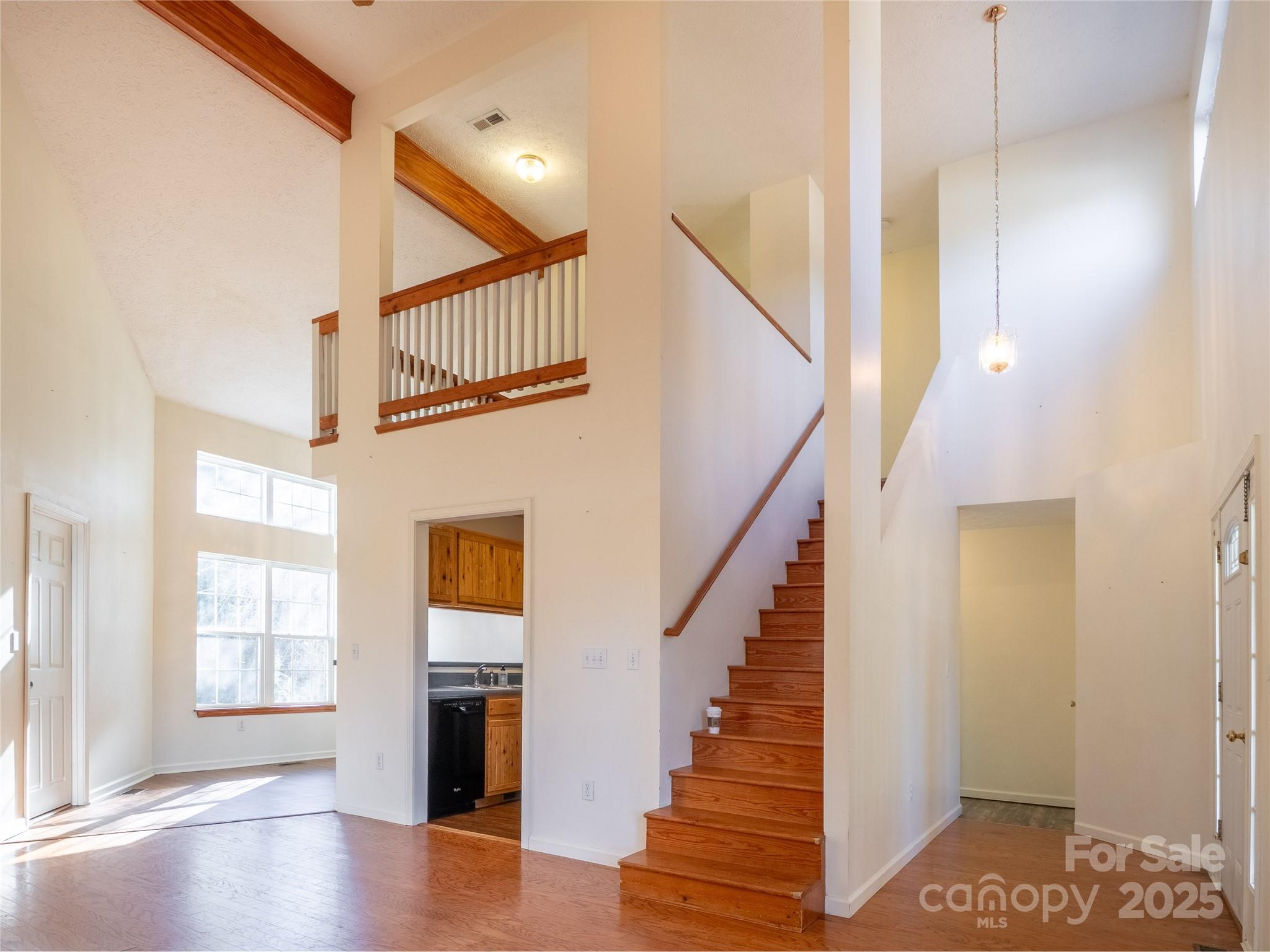 488 Oleta Road Hendersonville, NC 28792 - Photo 11 of 27 a view of entryway and hall with wooden floor