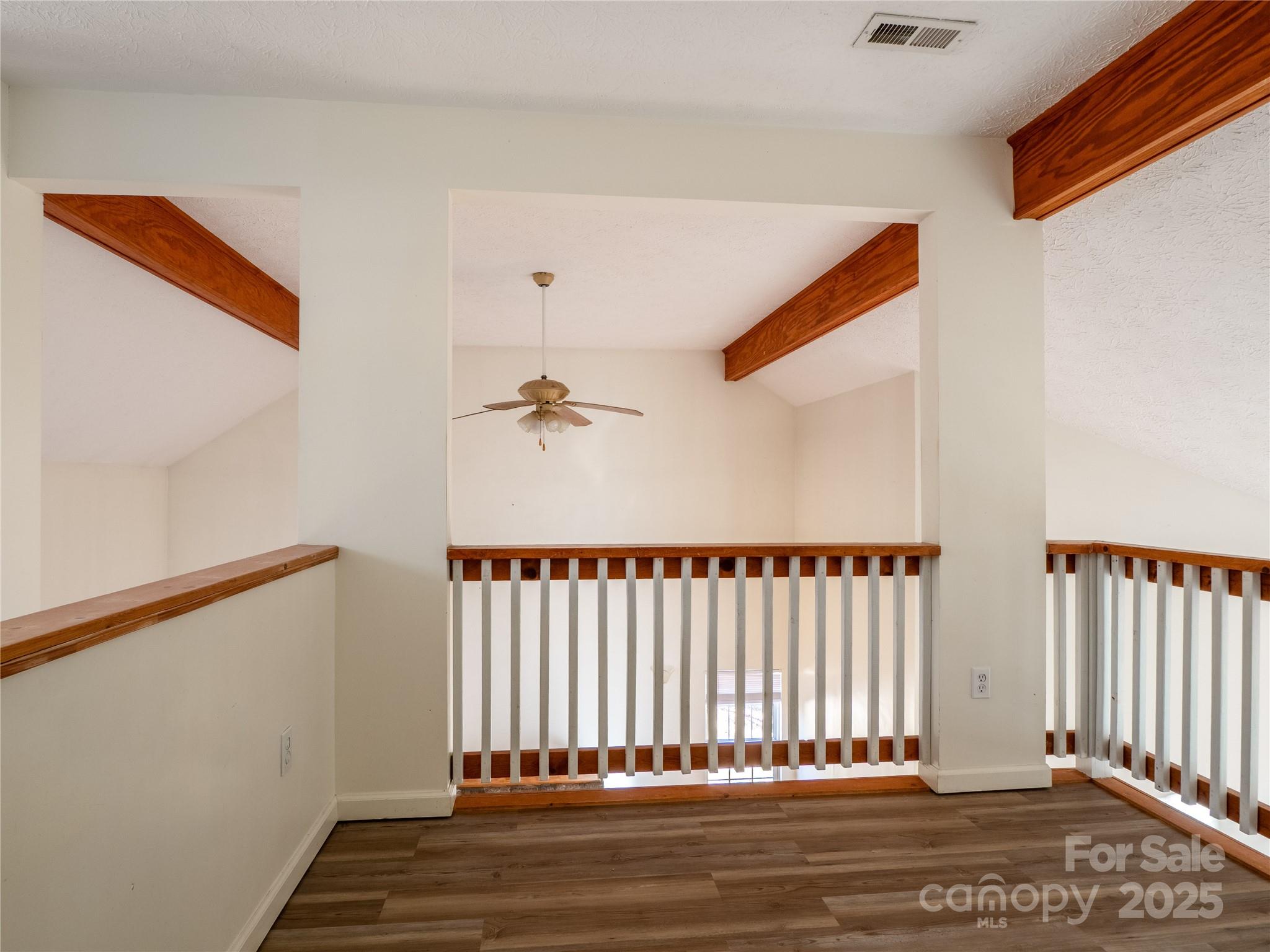 488 Oleta Road Hendersonville, NC 28792 - Photo 13 of 27 a view of a room with wooden floor