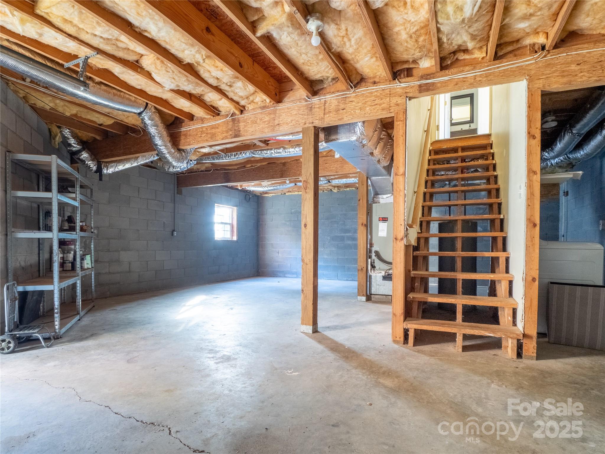 488 Oleta Road Hendersonville, NC 28792 - Photo 22 of 27 a view of an empty room with a fireplace