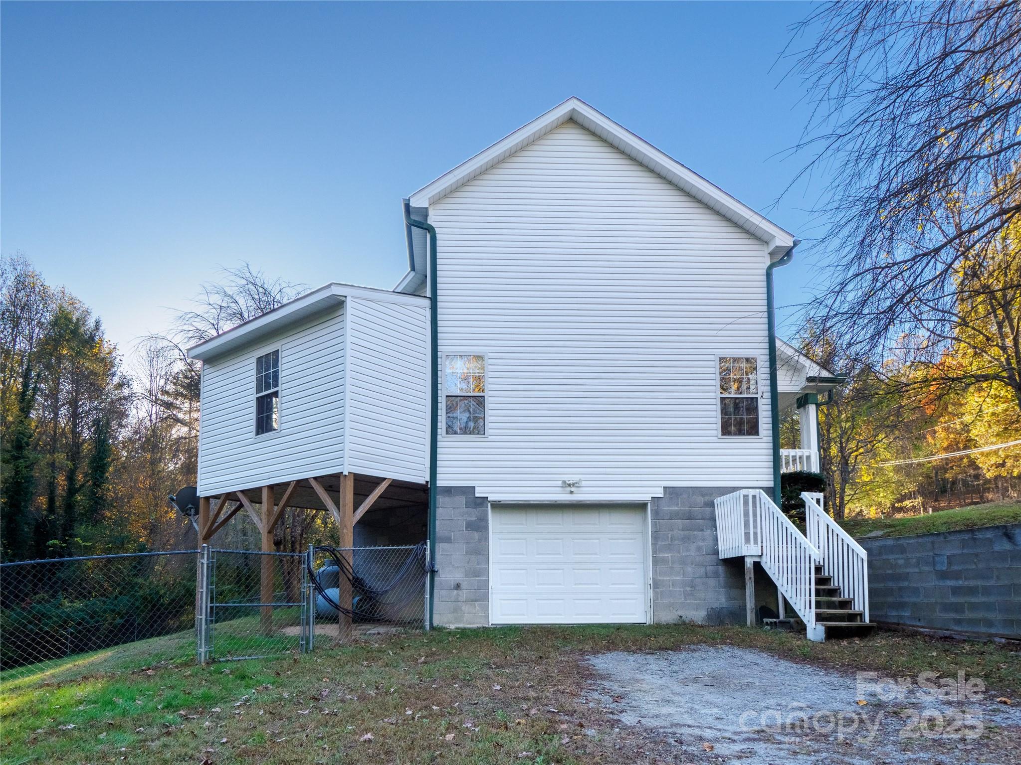 488 Oleta Road Hendersonville, NC 28792 - Photo 23 of 27 a view of a house with a yard