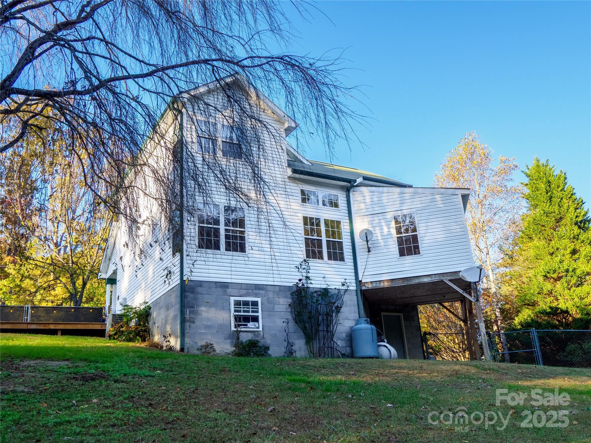 488 Oleta Road Hendersonville, NC 28792 - Photo 24 of 27 a view of a house with a yard