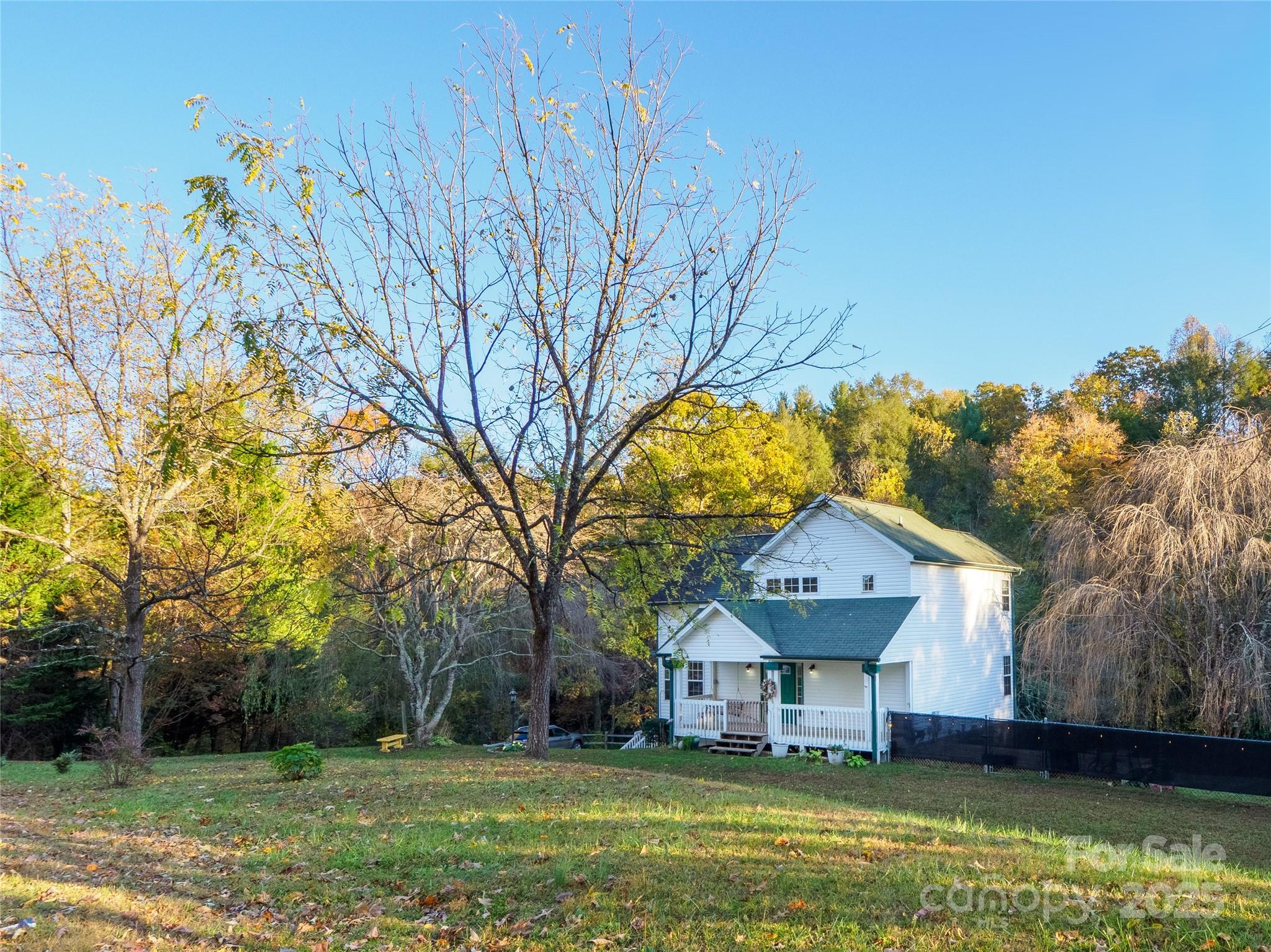 488 Oleta Road Hendersonville, NC 28792 - Photo 25 of 27 a front view of a house with a yard