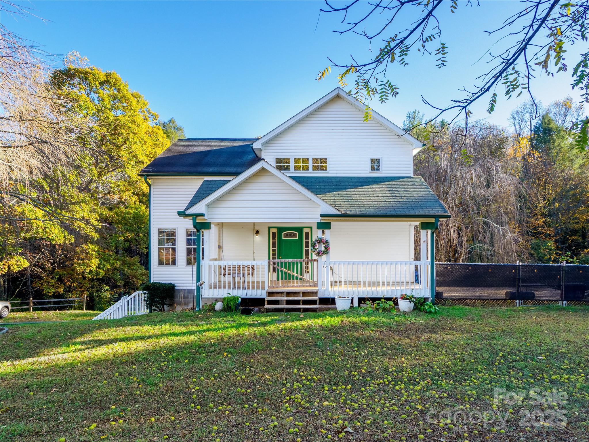 488 Oleta Road Hendersonville, NC 28792 - Photo 27 of 27 a front view of a house with a garden