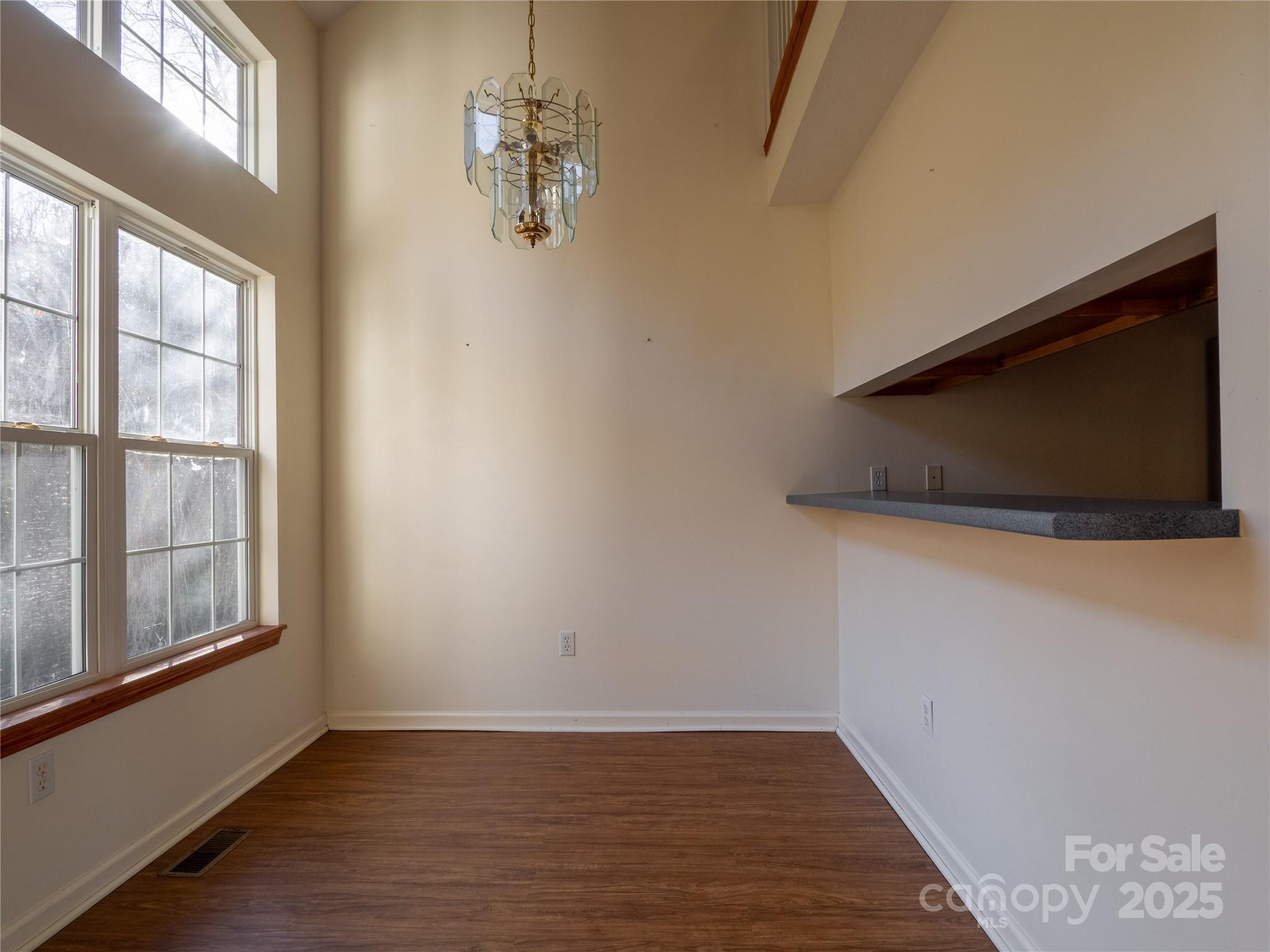 488 Oleta Road Hendersonville, NC 28792 - Photo 8 of 27 a view of livingroom with furniture and flat screen tv