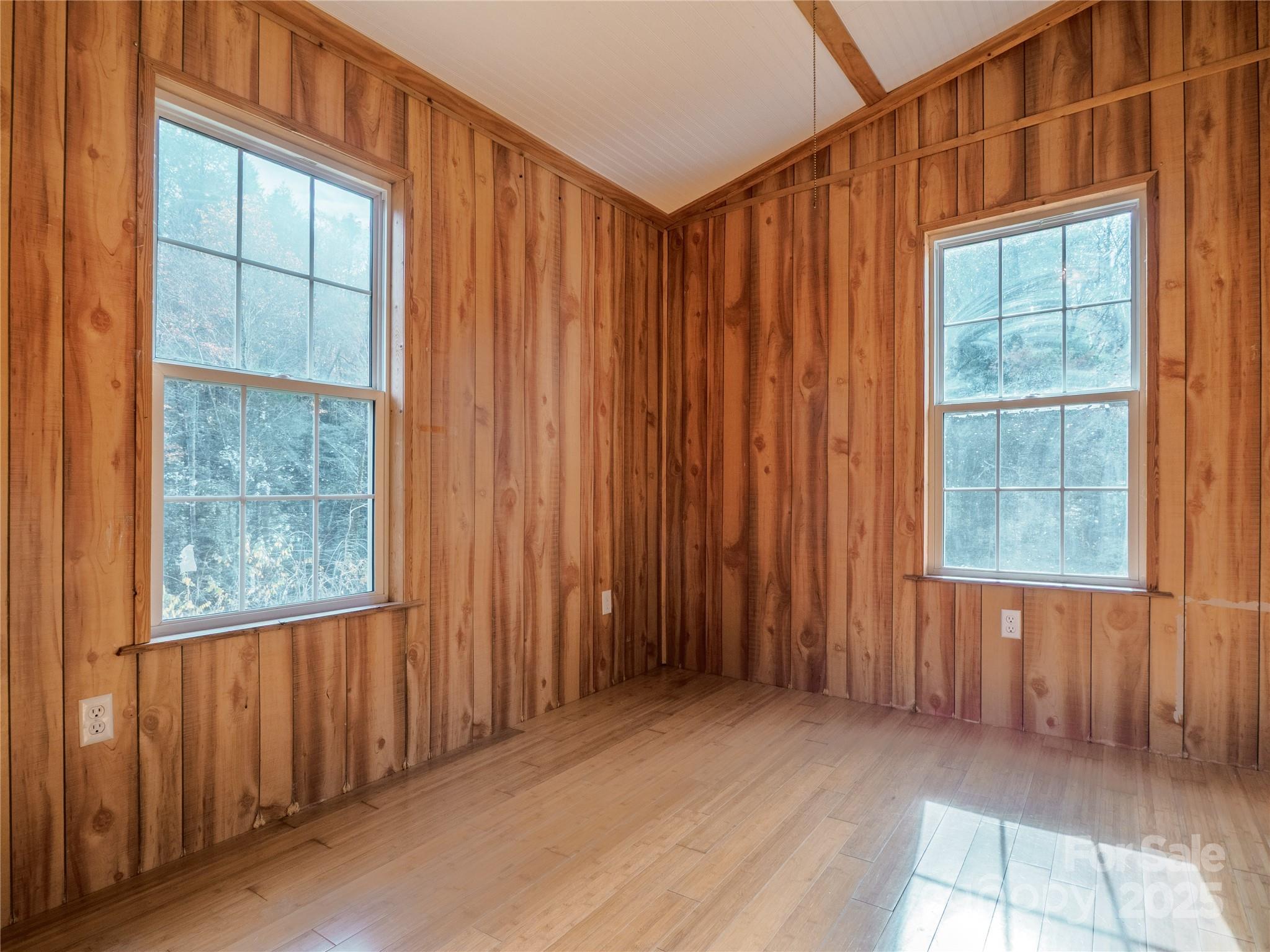 488 Oleta Road Hendersonville, NC 28792 - Photo 10 of 27 an empty room with windows