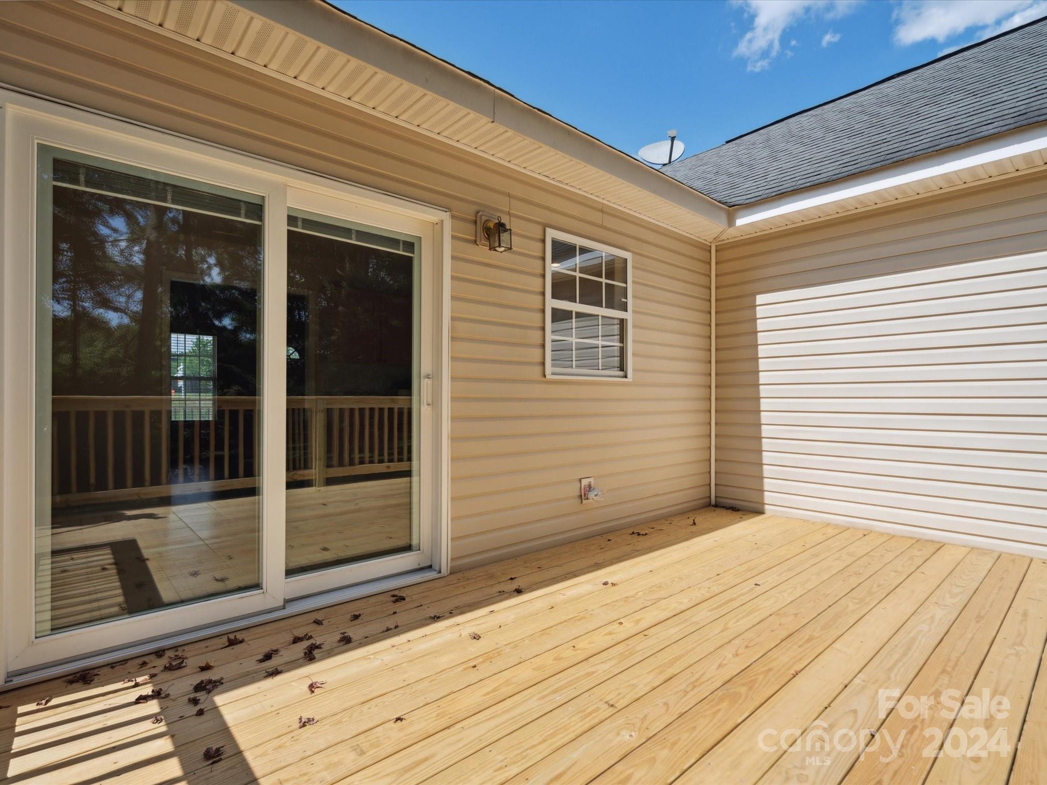 2113 River Chase Drive Monroe, NC 28110 - Photo 25 of 36 a view of a house with a balcony