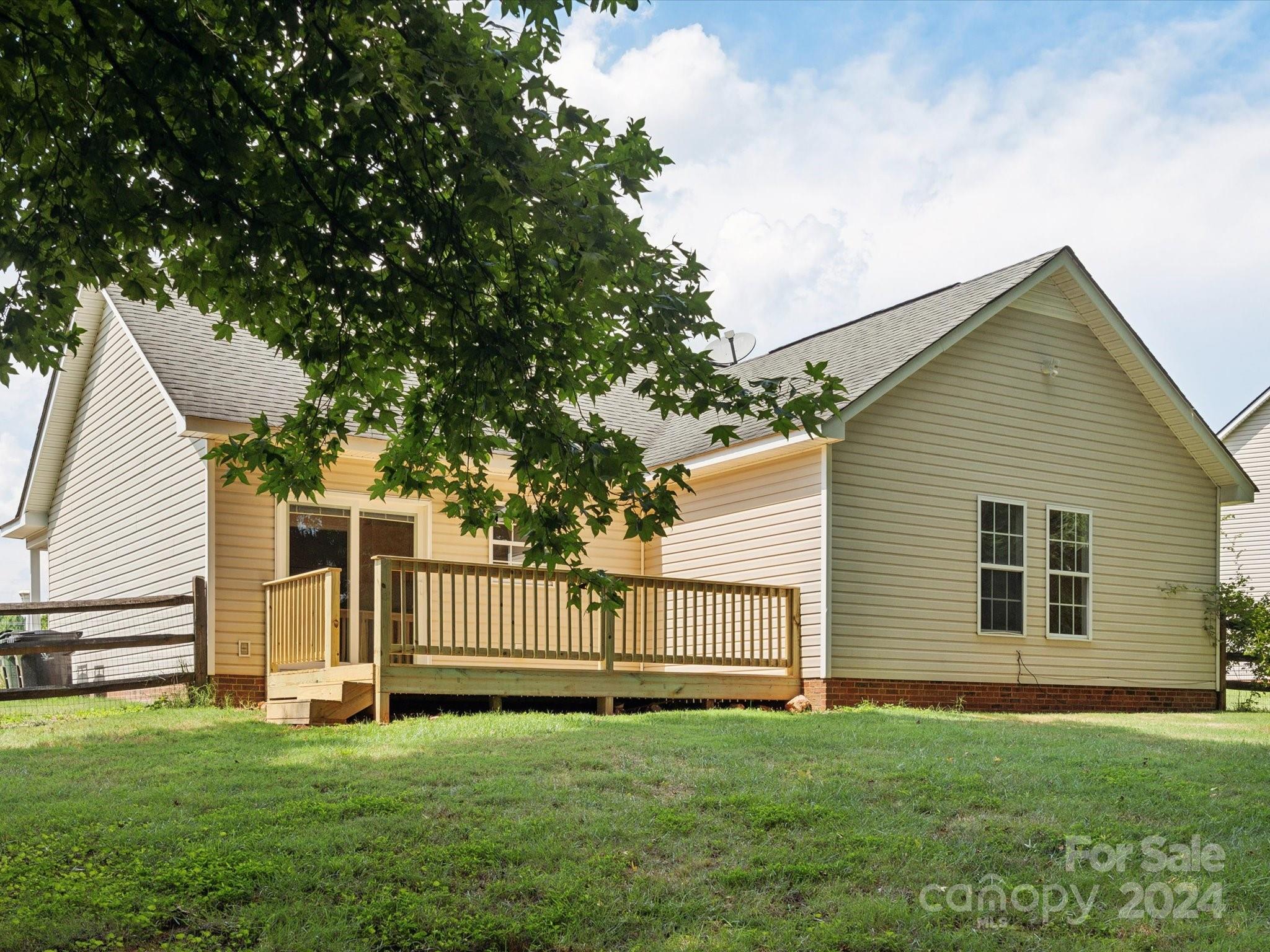 2113 River Chase Drive Monroe, NC 28110 - Photo 29 of 36 a view of a backyard with a garden