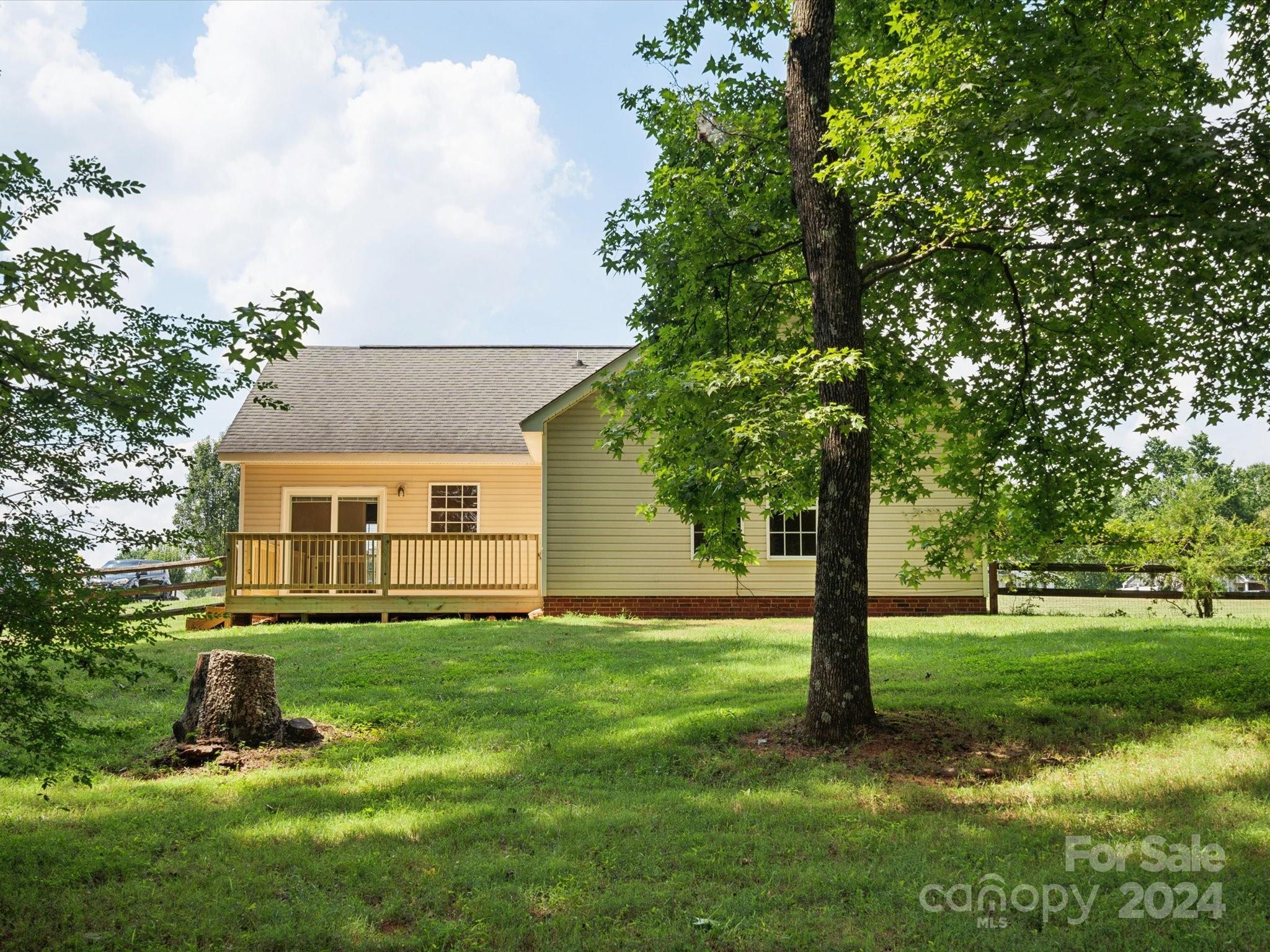 2113 River Chase Drive Monroe, NC 28110 - Photo 30 of 36 a front view of house with yard and green space