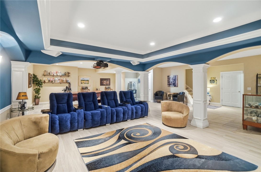472 Timber Walk Court Springboro, OH 45066 - Photo 39 of 86 This entertainment room features bright recessed lighting and a large ceiling for an airy feel.