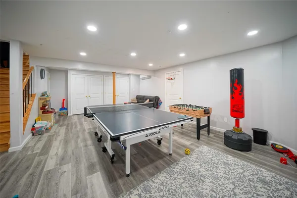 a room with furniture and a wooden floor