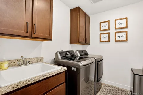 a utility room with washer and dryer