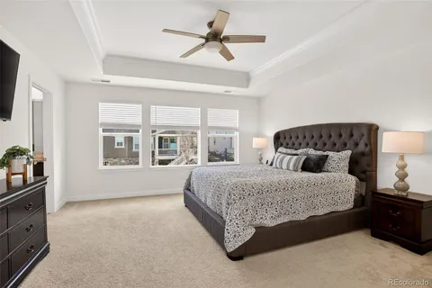 a bed room with a bed and a tv