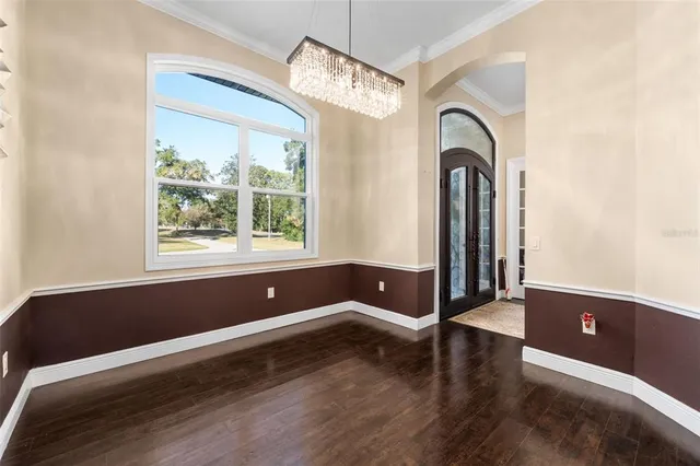 a view of an empty room and window