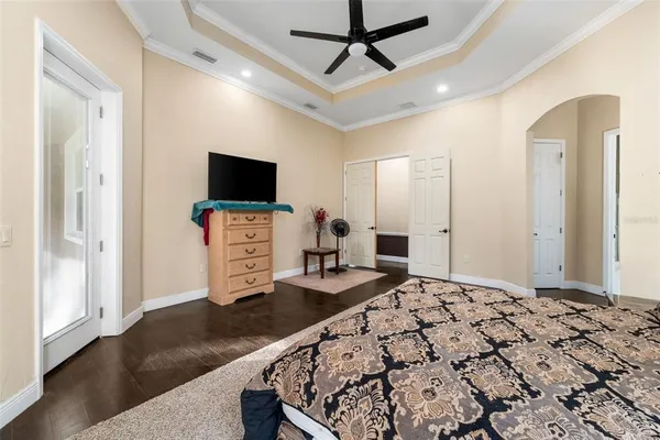 a spacious bathroom with a granite countertop tub sink and mirror
