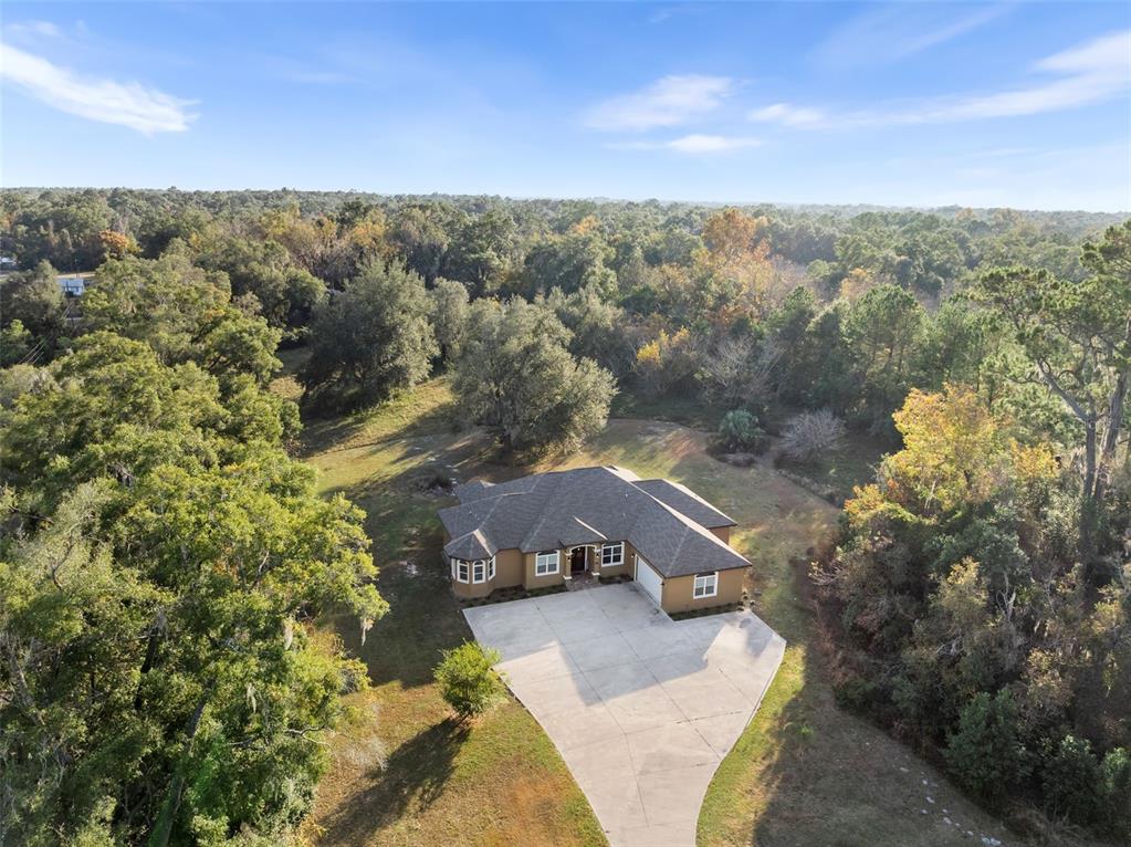 16635 Southwest 139th Avenue Archer, FL 32618 - Photo 3 of 48 a view of a city