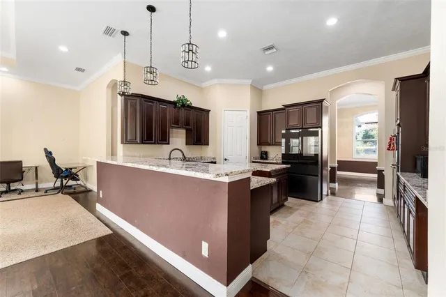 a kitchen with a stove and a sink