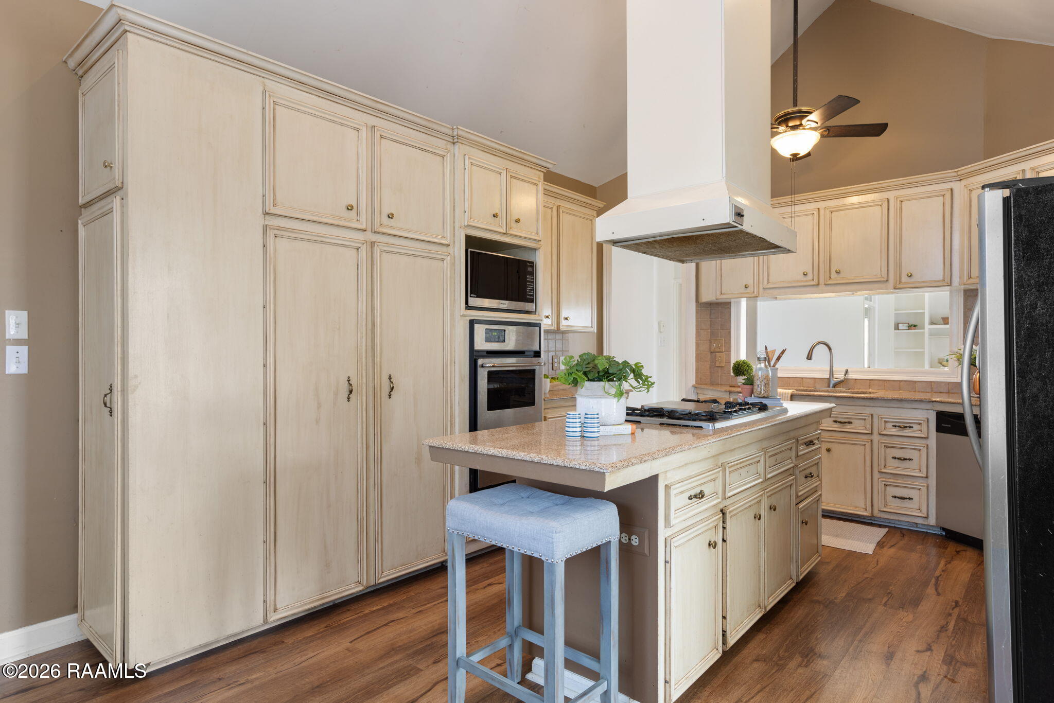 509 Bellevue Plantation Road Lafayette, LA 70503 - Photo 6 of 9 Kitchen Peak through to Living