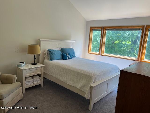 324 Hollow Road, Unit 325 East Stroudsburg, PA 18302 - Photo 11 of 17 a bedroom with a bed and a window