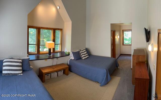 324 Hollow Road, Unit 325 East Stroudsburg, PA 18302 - Photo 14 of 17 a living room with furniture and a window