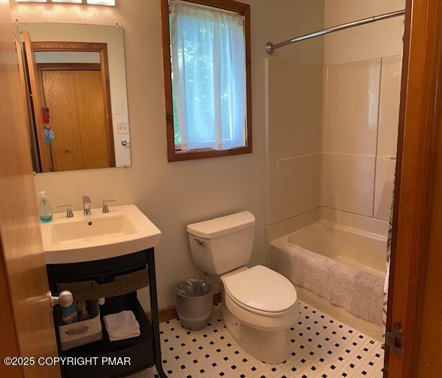324 Hollow Road, Unit 325 East Stroudsburg, PA 18302 - Photo 16 of 17 a bathroom with a sink a toilet and shower