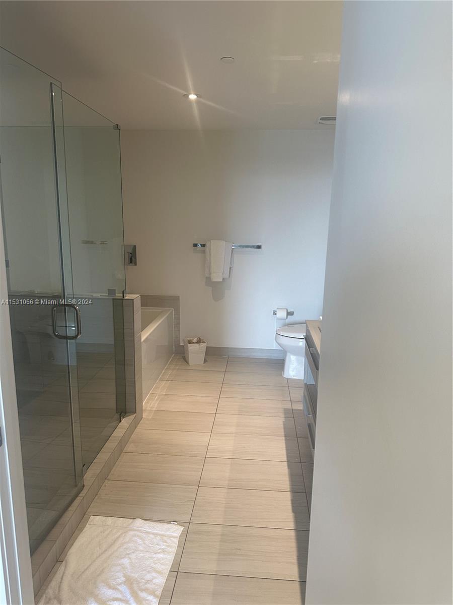 4010 South Ocean Drive, Unit R707 Hollywood, FL 33019 - Photo 34 of 70 a bathroom with a sink and a toilet