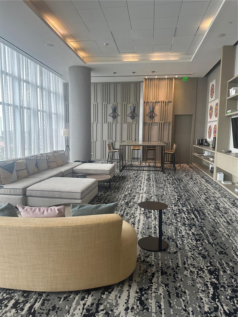 4010 South Ocean Drive, Unit R707 Hollywood, FL 33019 - Photo 60 of 70 a living room with a couch