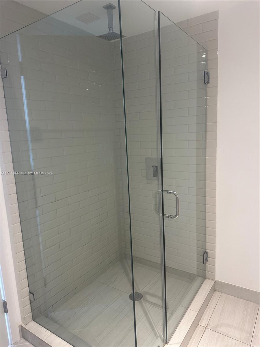 4010 South Ocean Drive, Unit R707 Hollywood, FL 33019 - Photo 9 of 70 a bathroom with a shower