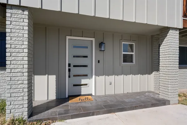 a view of a house with a garage