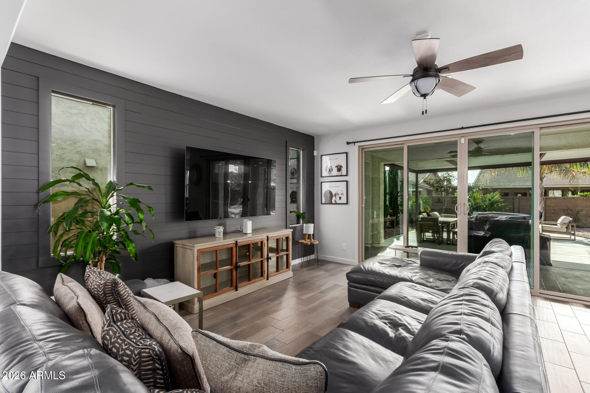 22083 East Camacho Road Queen Creek, AZ 85142 - Photo 11 of 42 a living room with furniture and a large window