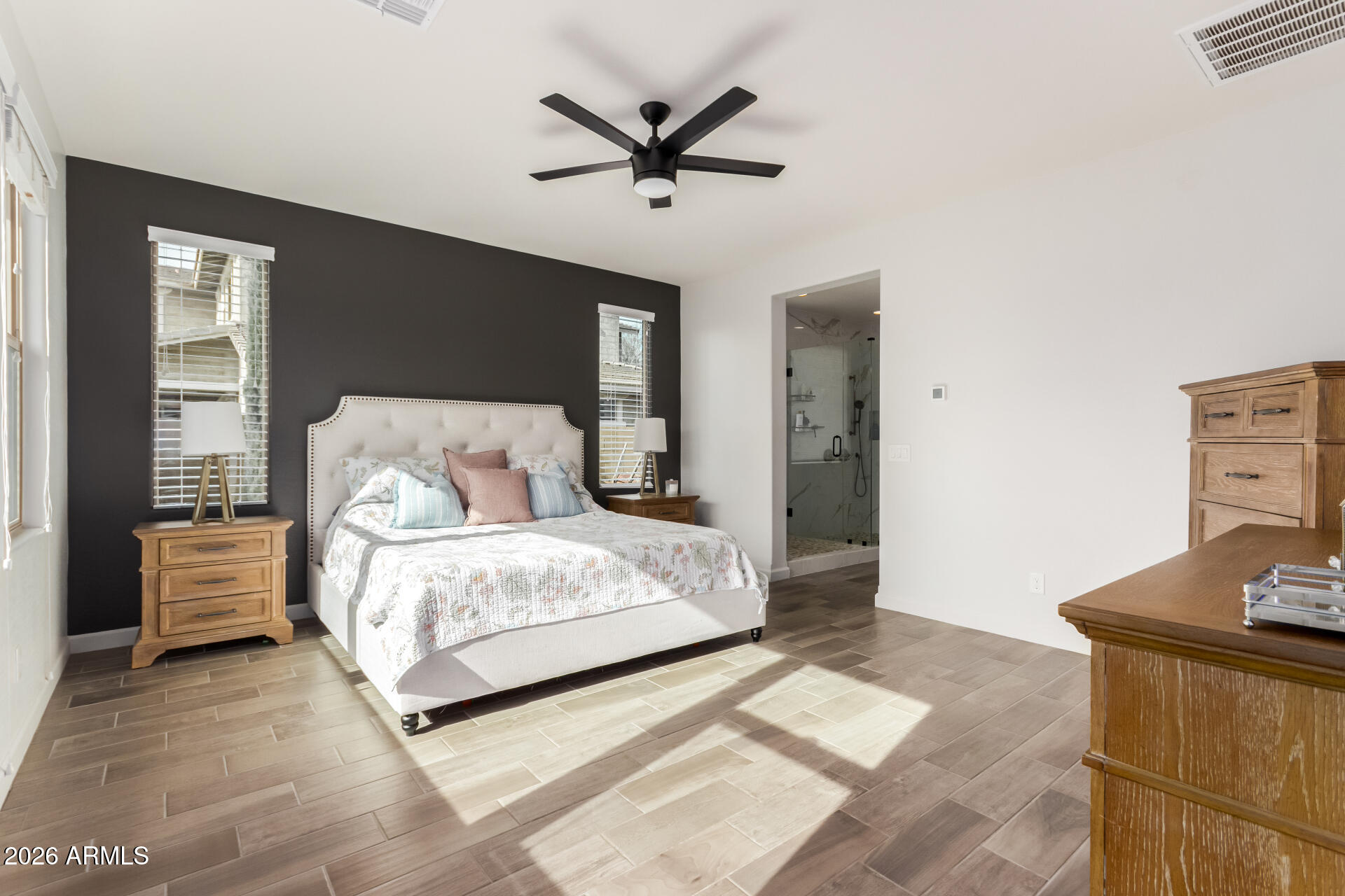 22083 East Camacho Road Queen Creek, AZ 85142 - Photo 20 of 42 a bedroom with a bed and window