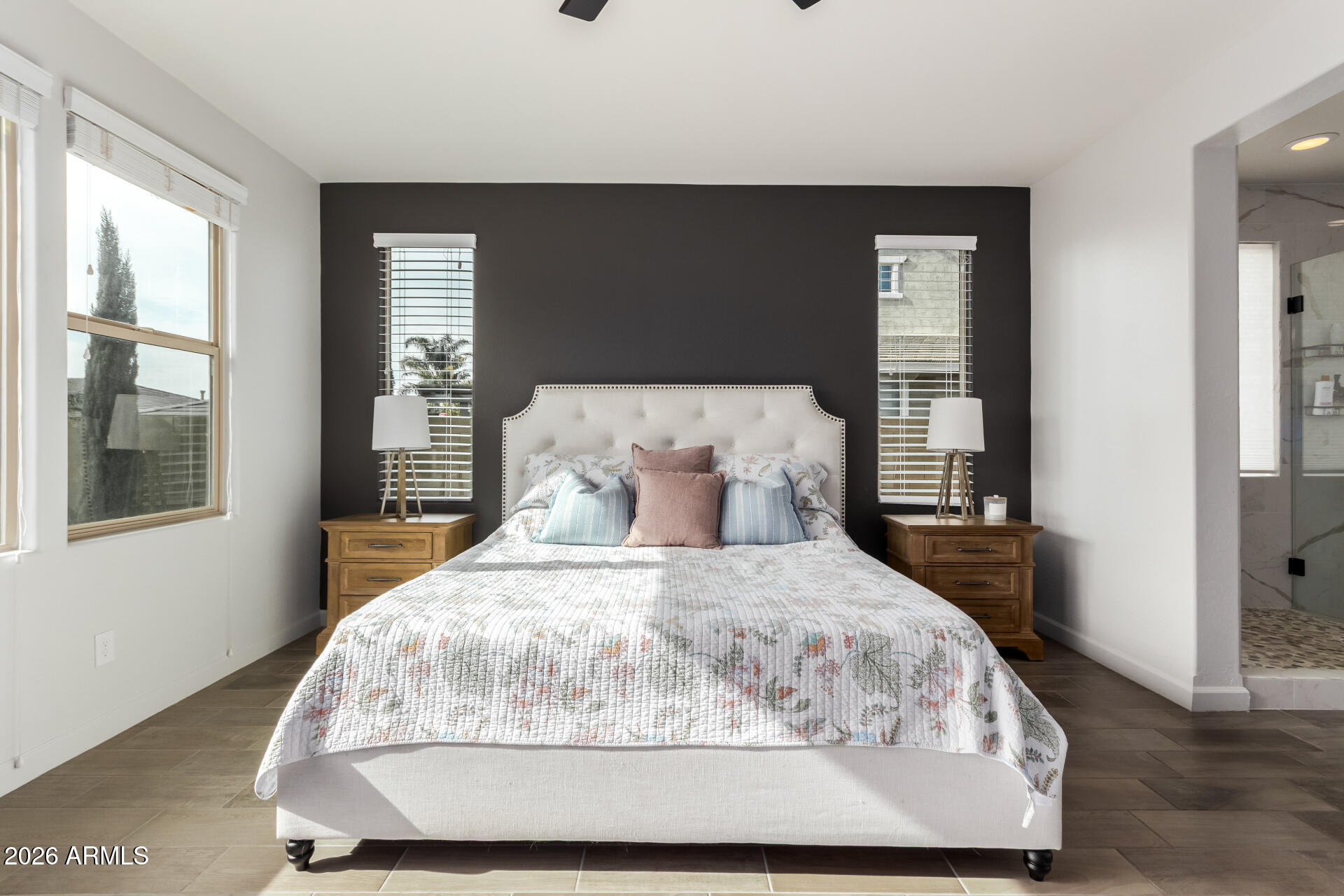 22083 East Camacho Road Queen Creek, AZ 85142 - Photo 22 of 42 a bedroom with a bed and window