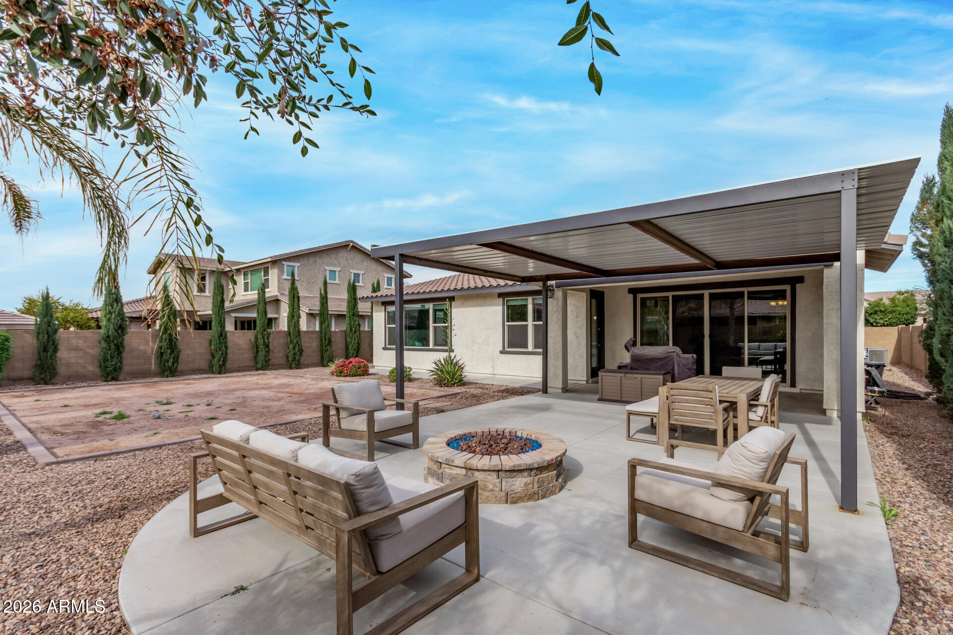 22083 East Camacho Road Queen Creek, AZ 85142 - Photo 37 of 42 a view of a patio with couches and potted plants
