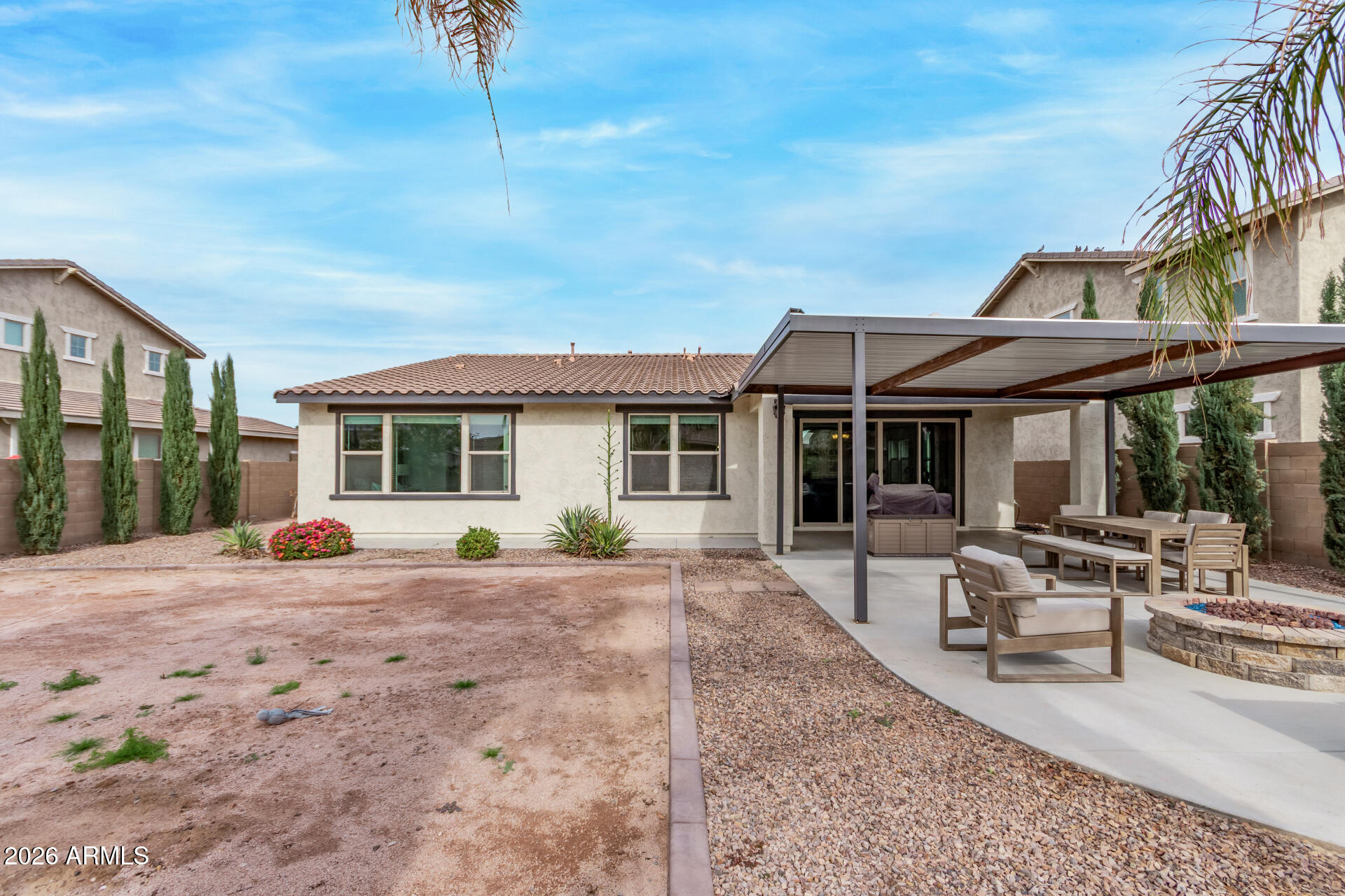 22083 East Camacho Road Queen Creek, AZ 85142 - Photo 38 of 42 a house view with a sitting space and garden space