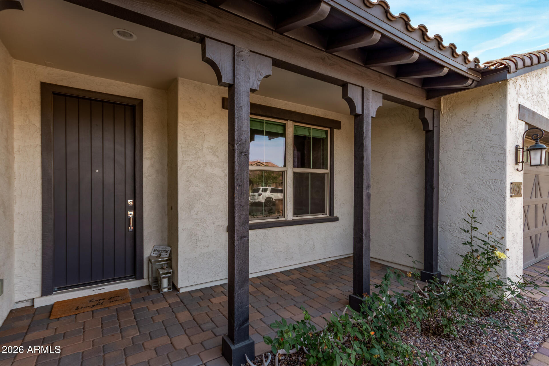 22083 East Camacho Road Queen Creek, AZ 85142 - Photo 6 of 42 a view of house with front door and wooden floor