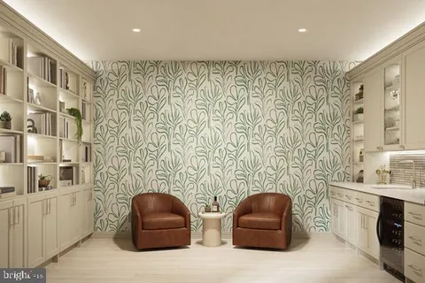 a bathroom with a toilet and a sink