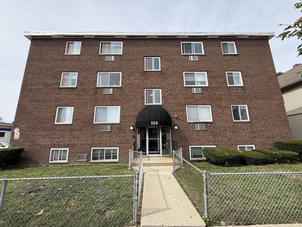 154 Main Street, Unit 32 Everett, MA 02149 - Photo 9 of 10 a front view of a house