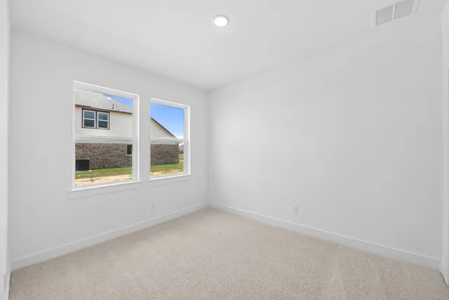 an empty room with a window