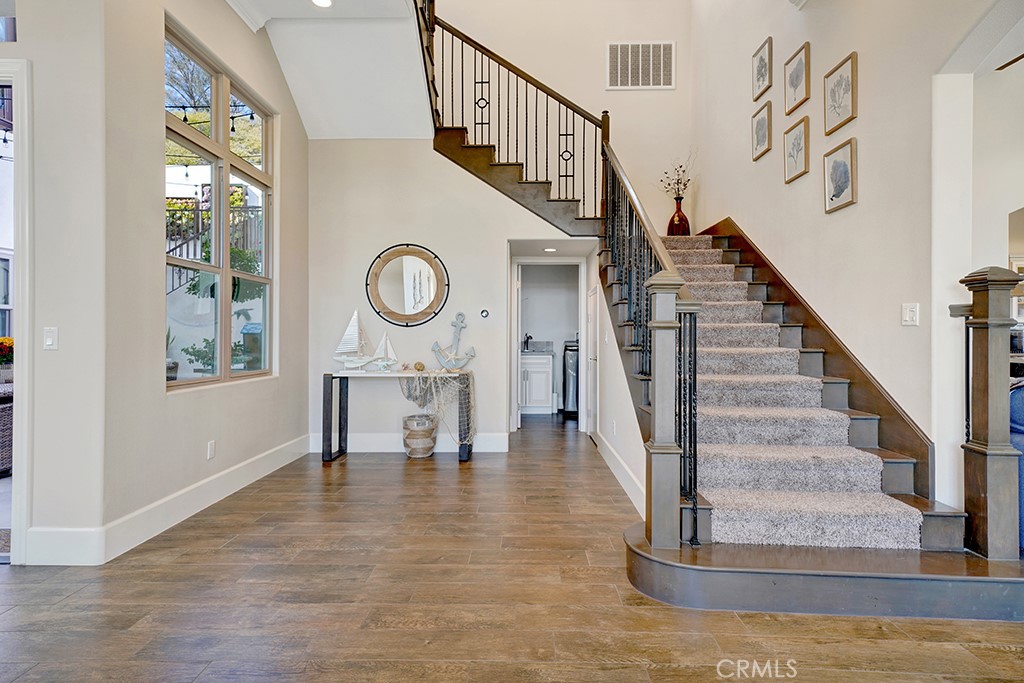 75 Marbella San Clemente, CA 92673 - Photo 18 of 54 a view of entryway and hall with wooden floor