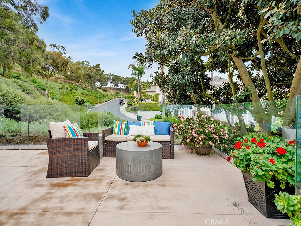 75 Marbella San Clemente, CA 92673 - Photo 24 of 54 a view of a patio with couches and a potted plant