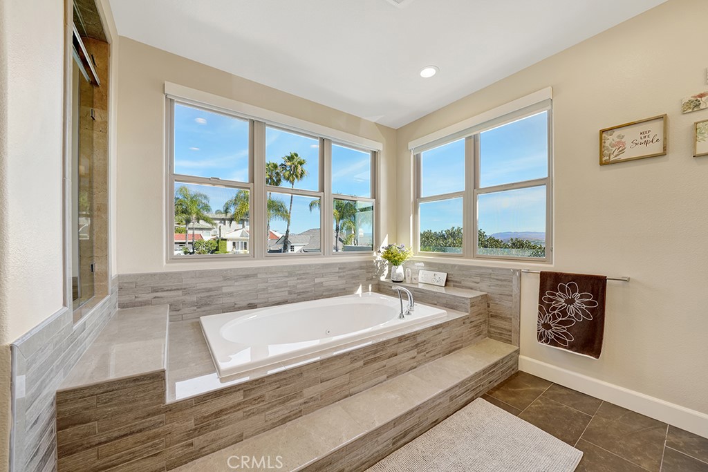 75 Marbella San Clemente, CA 92673 - Photo 38 of 54 a spacious bathroom with a tub and window