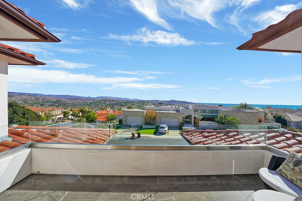 75 Marbella San Clemente, CA 92673 - Photo 40 of 54 a view of a terrace with a bench