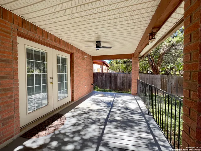 a view of a building with a tree