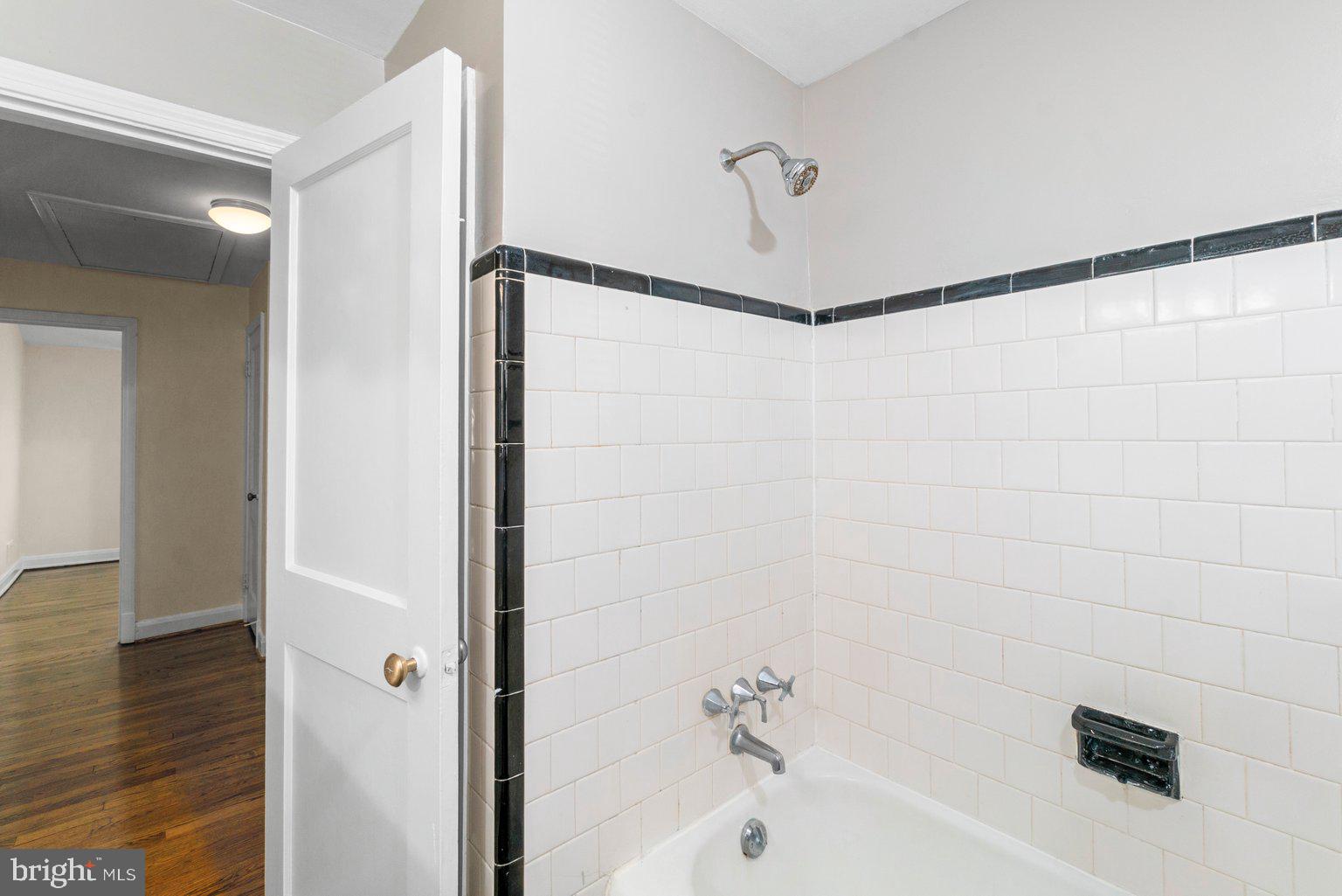 1917 Ramblewood Road Baltimore, MD 21239 - Photo 15 of 22 Ceramic Tile Surround