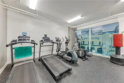 a view of a room with gym equipment