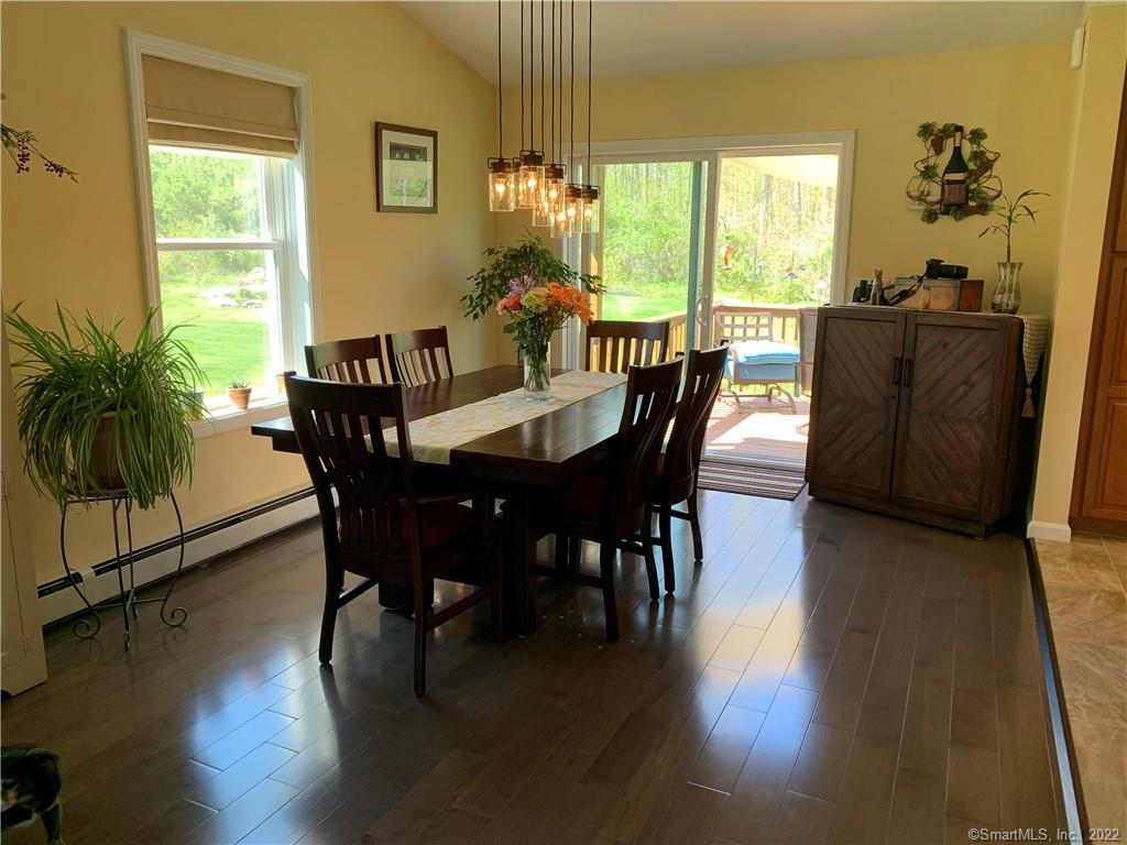 111 Buntz Road Canterbury, CT 06331 - Photo 1 of 1 a view of a dining room with furniture window and wooden floor
