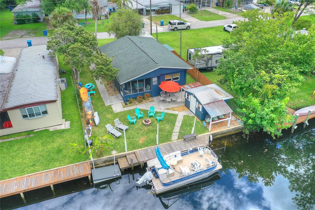 an outdoor space with furniture and umbrella