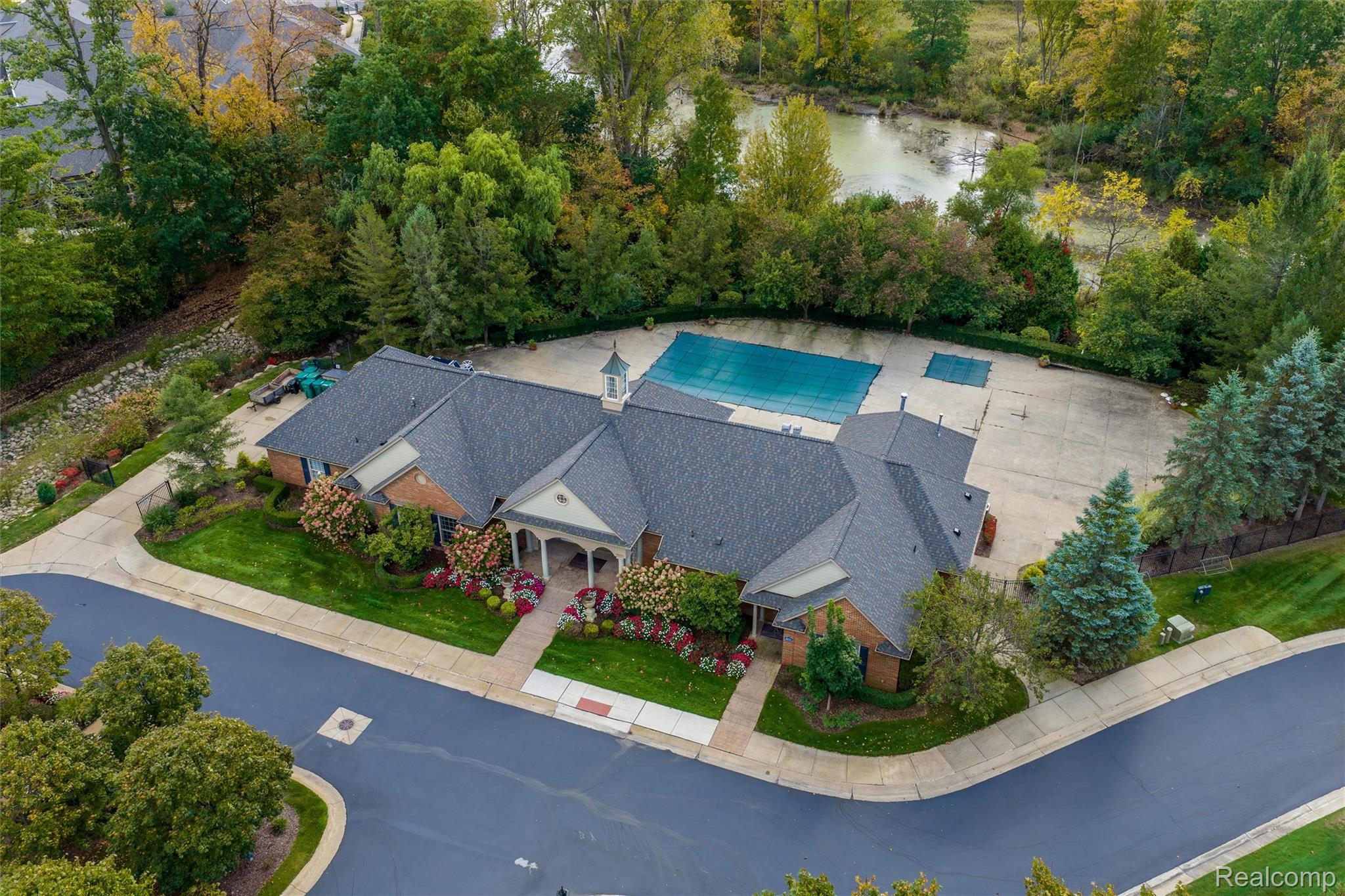 3582 Tremonte Circle Rochester, MI 48306 - Photo 21 of 23 Workout center, bathrooms, pool and jacuzzi