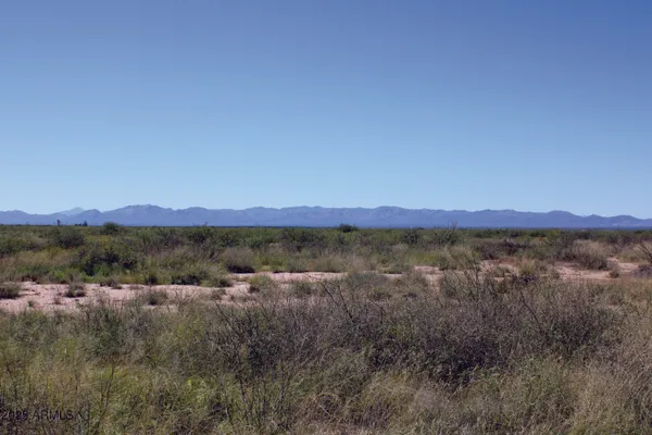 a view of mountain and sunset