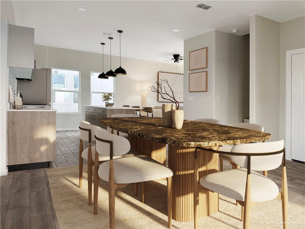 4804 Tyler, Unit 3 McAllen, TX 78503 - Photo 7 of 30 a kitchen with a table and chairs